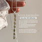 Green tourmaline pear stone pendant with a polished silver design