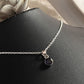 Elegant round Iolite gemstone pendant in silver