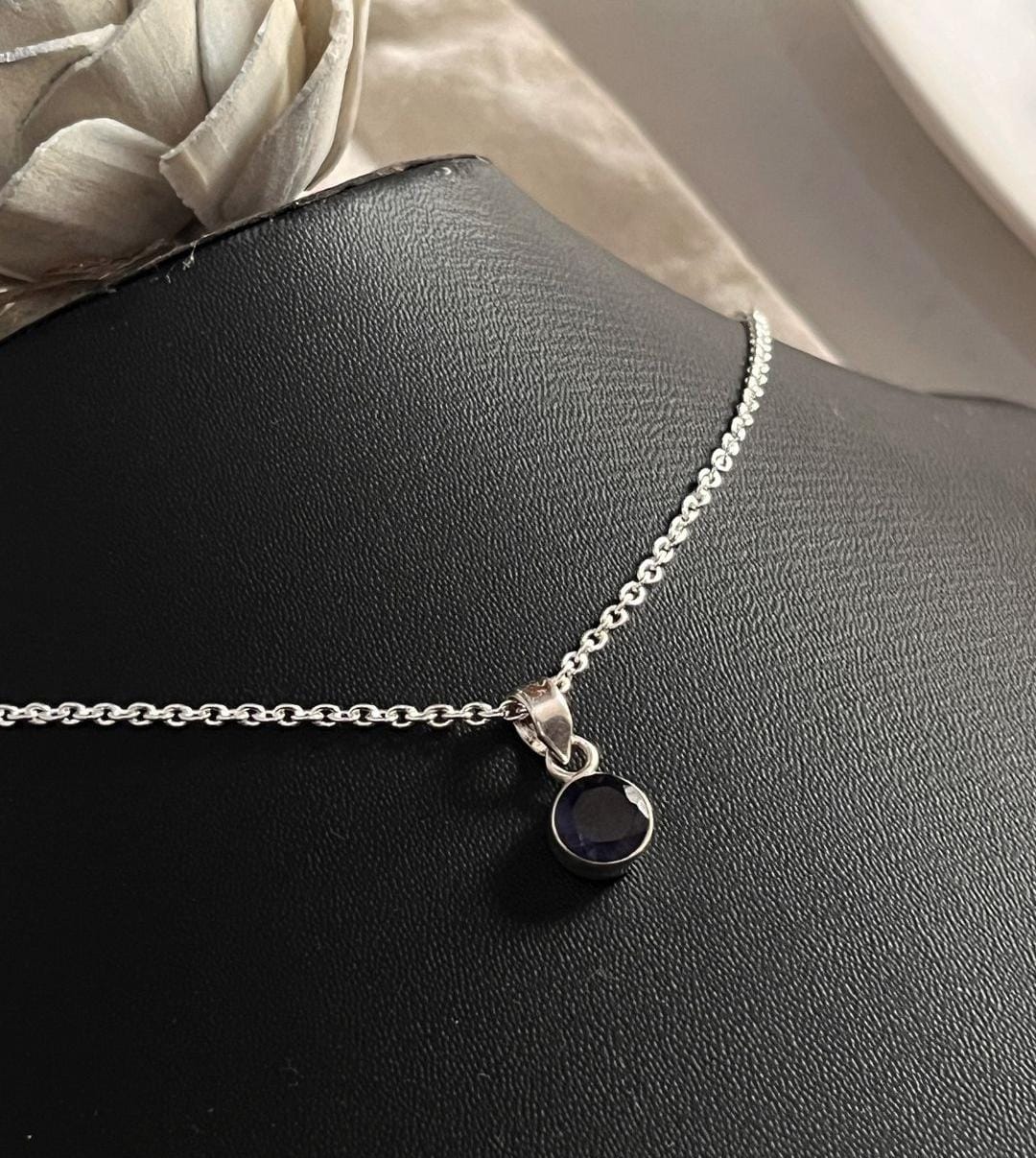 Elegant round Iolite gemstone pendant in silver