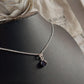 Modern round Iolite pendant in sterling silver design