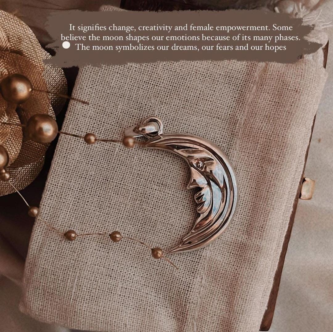 Large crescent moon silver pendant with a modern, elegant look