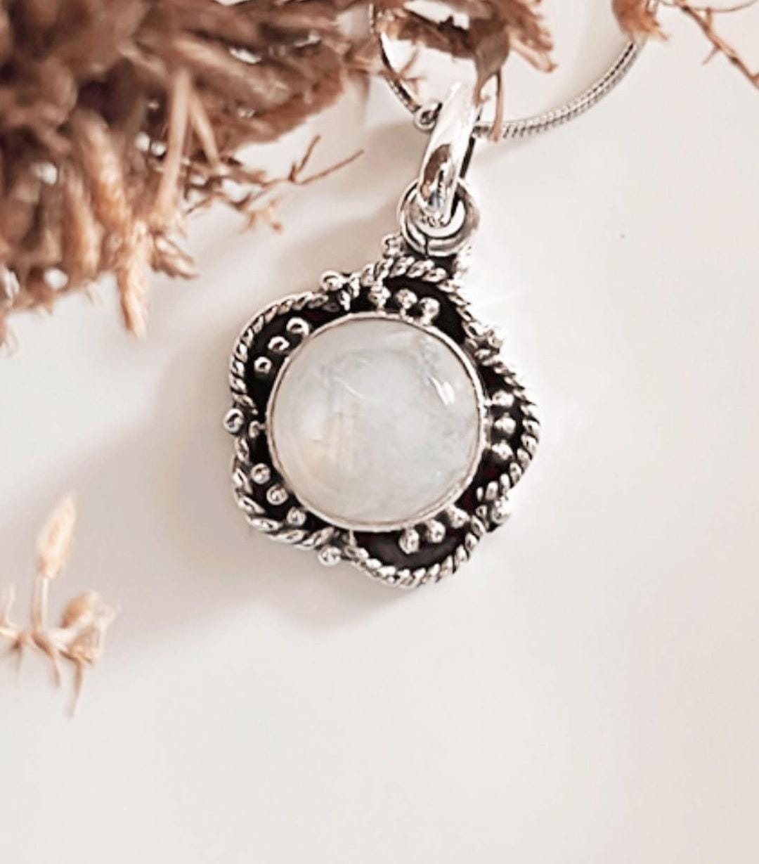 Charming Moonstone Flower Pendant in Silver