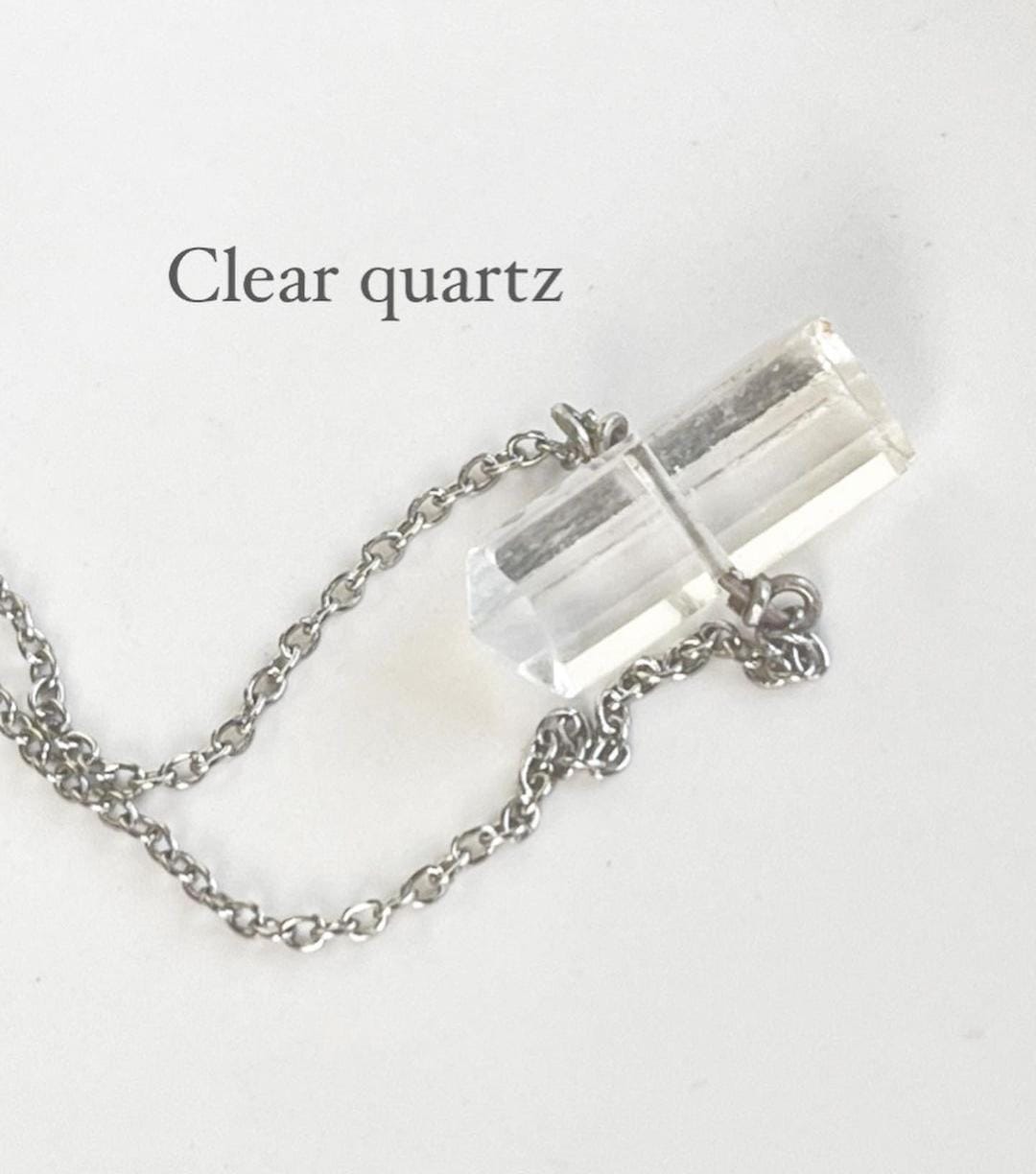 Elegant necklace featuring clear quartz pencil crystal pendant