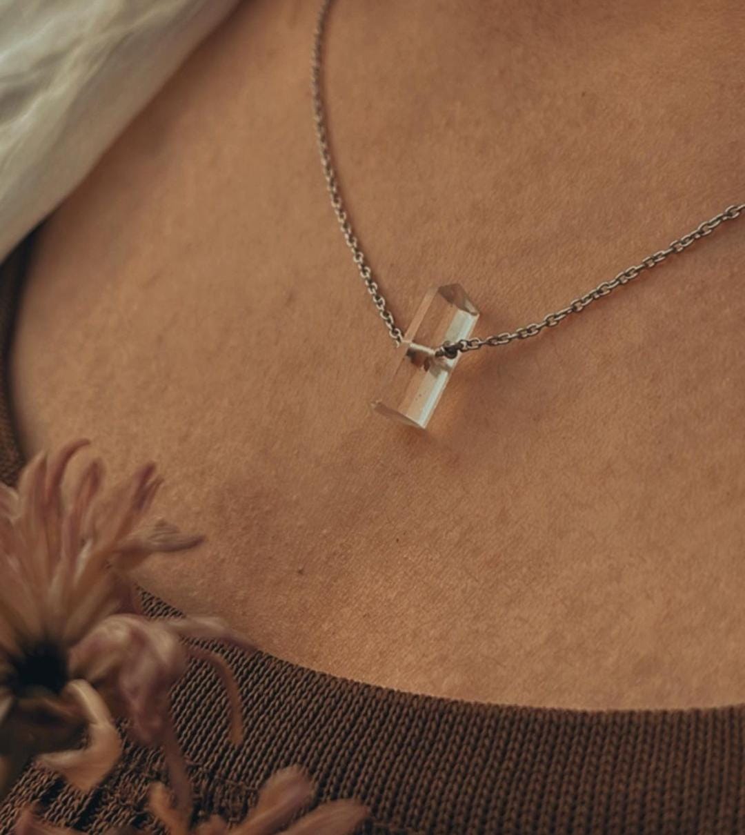 Sleek clear quartz pencil crystal necklace with polished finish