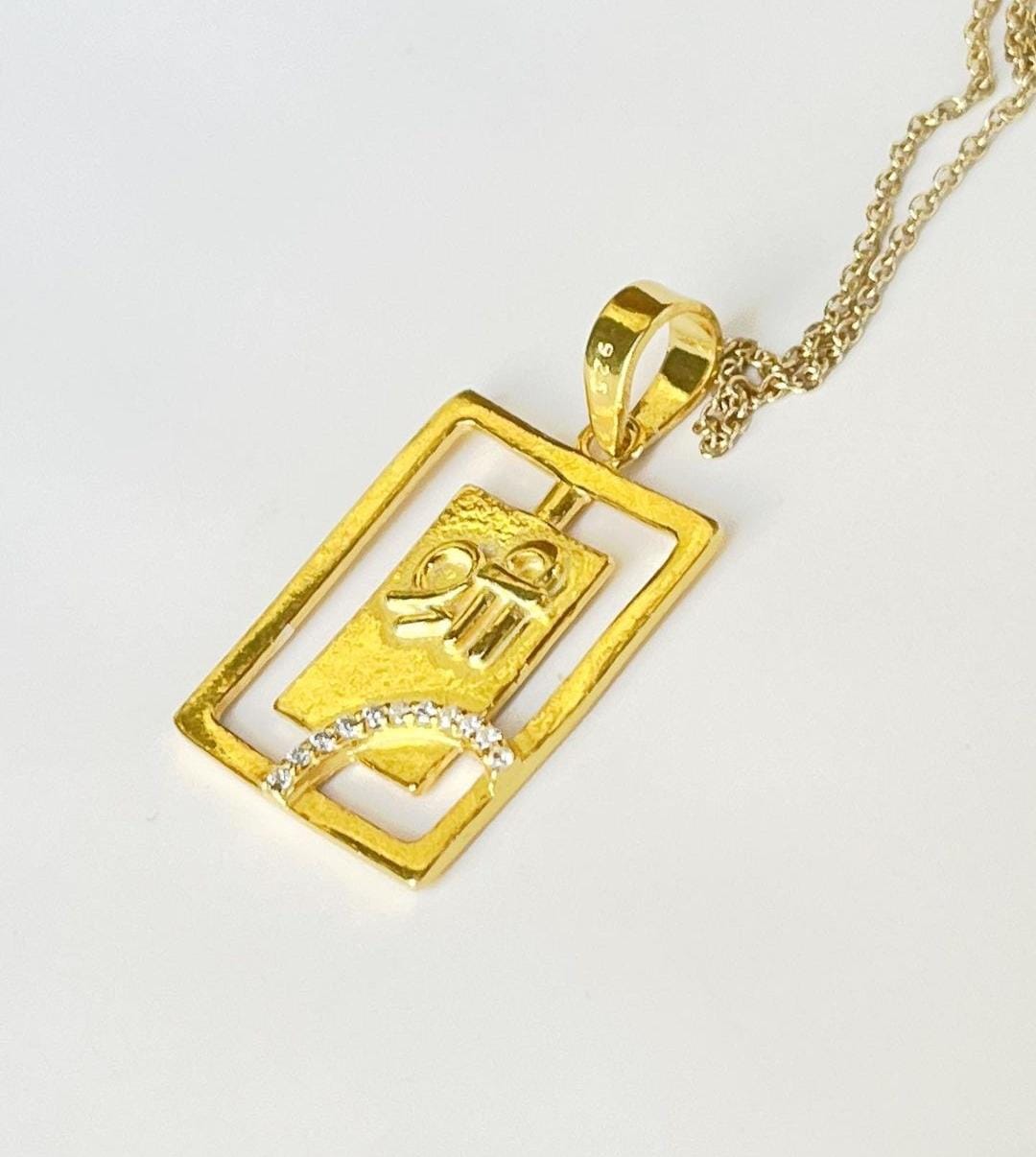 Elegant gold plated silver pendant with Shree symbol and CZ