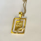 Handcrafted Shree pendant in gold plated silver with CZ stones