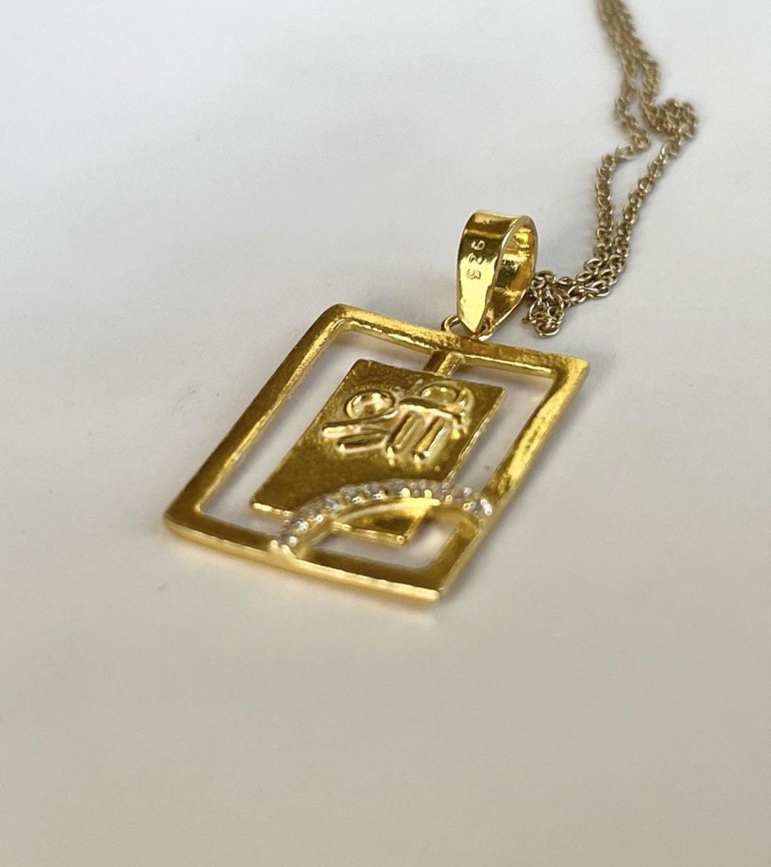 Sterling silver Shree pendant with cubic zirconia and gold plating