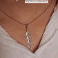 Charming feather silver pendant with intricate design and graceful shape