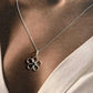 Elegant Silver Pendant Featuring Amethyst and Floral Motif