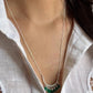 Sterling silver necklace featuring a vibrant green onyx stone