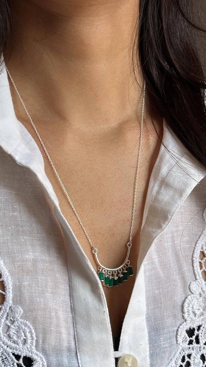 Sterling silver necklace featuring a vibrant green onyx stone