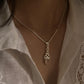 Handcrafted rose quartz pendant with trinity knot in silver