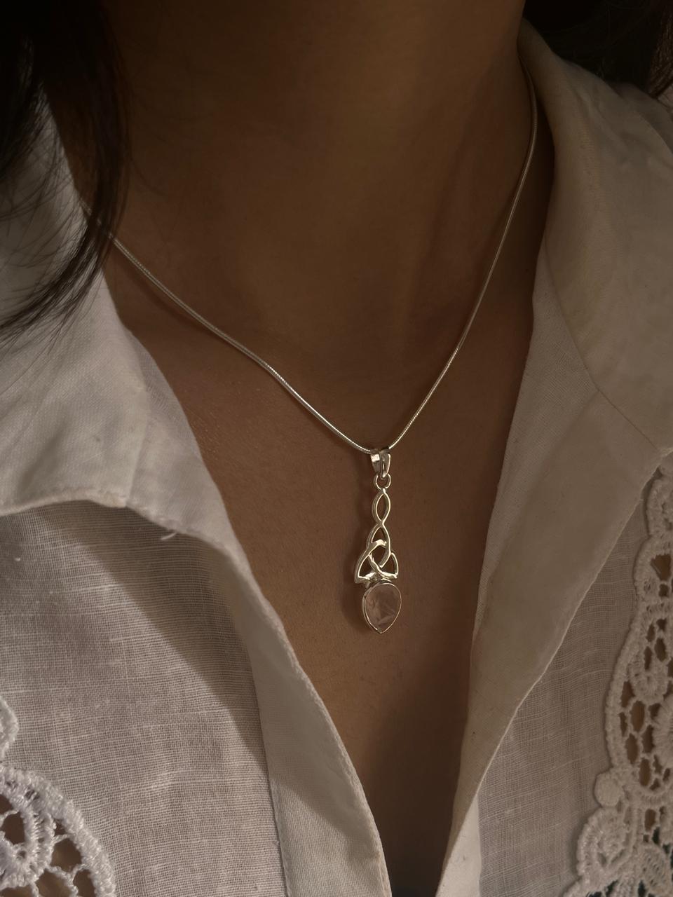 Handcrafted rose quartz pendant with trinity knot in silver