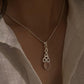 Timeless rose quartz trinity knot pendant in sterling silver