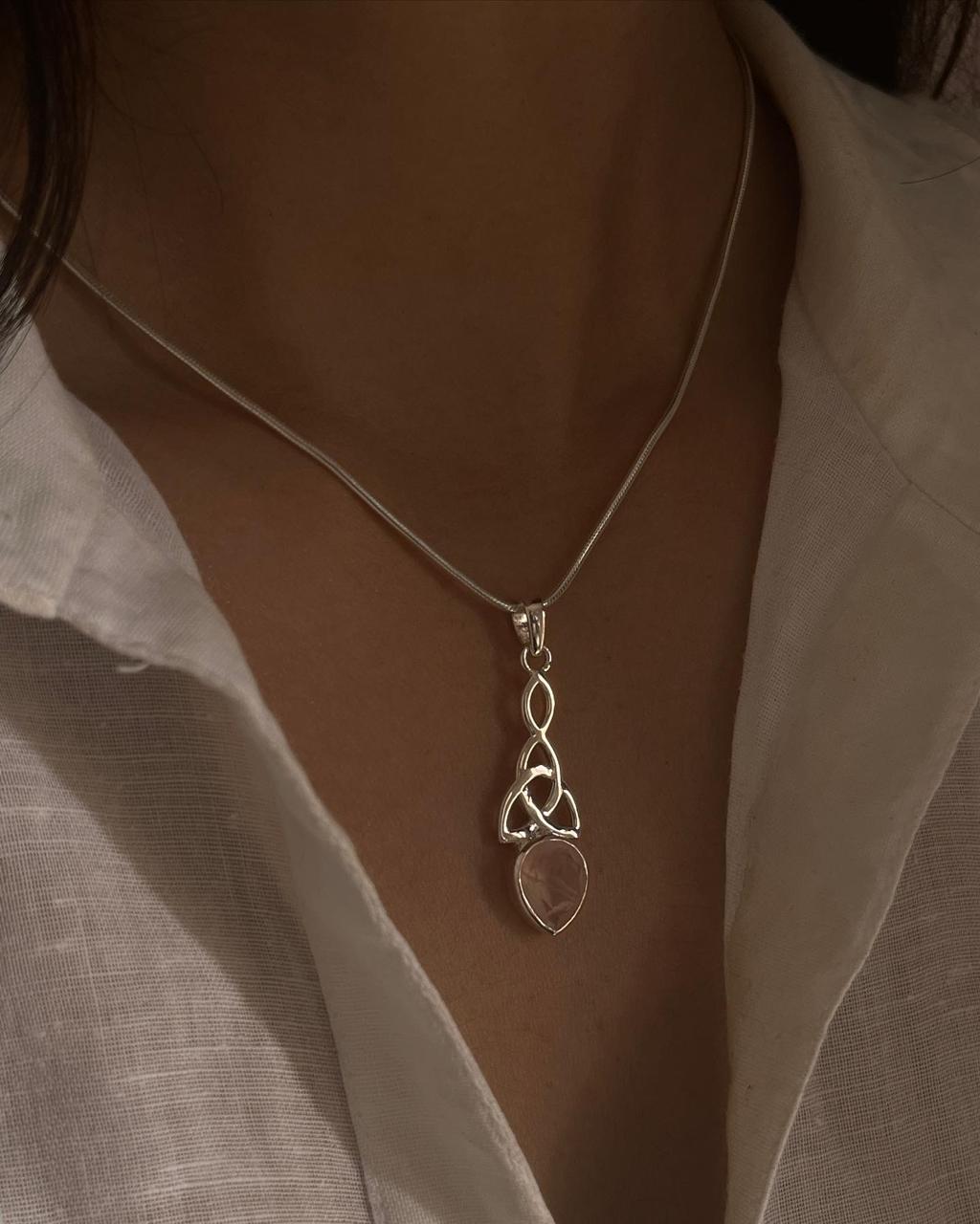 Timeless rose quartz trinity knot pendant in sterling silver