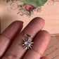 Delicate moonstone sunshine pendant with silver setting