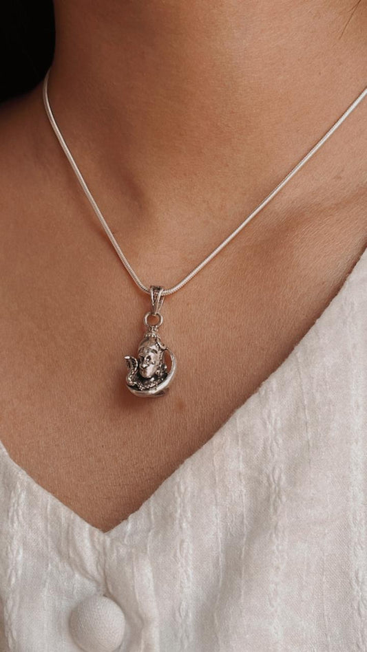 Handcrafted silver pendant featuring ShivaJi face design