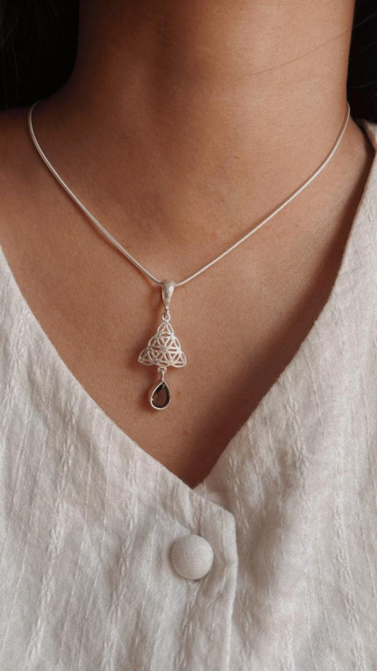 Timeless Celtic knot pendant with smokey quartz gemstone