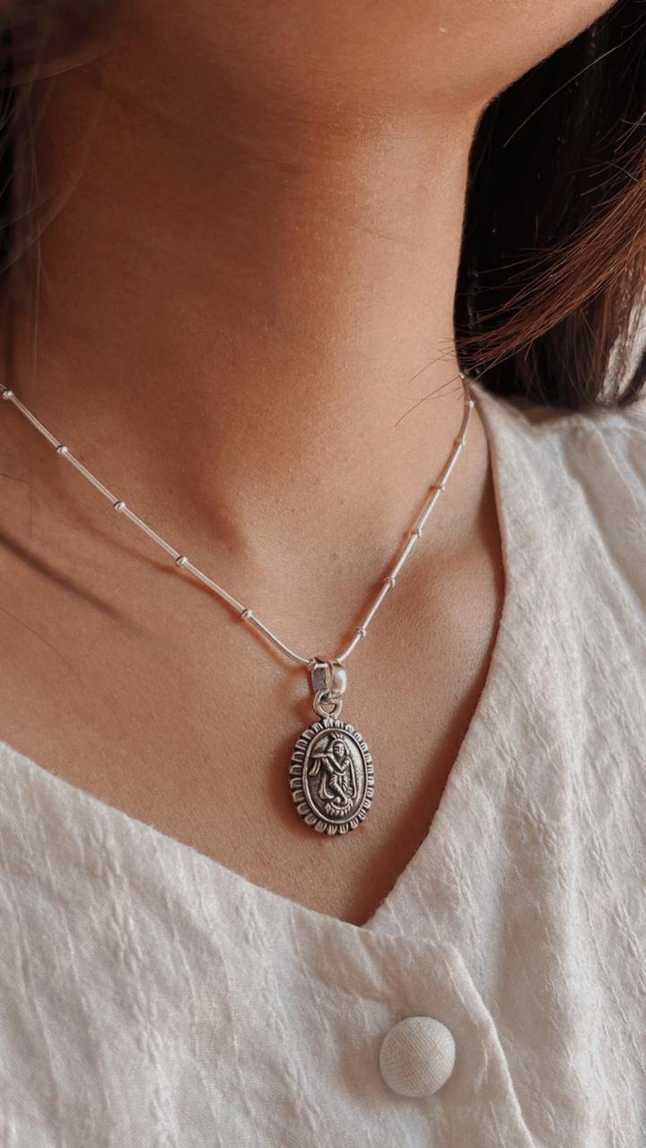 Krishna Floral Design Oval Silver Pendant for Devotion
