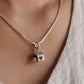 Cute dog house pendant in sterling silver with detailed design