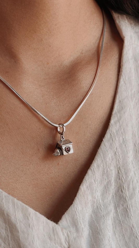 Cute dog house pendant in sterling silver with detailed design