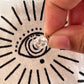 Close-up of clear quartz oval cut pendant in polished silver setting