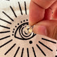 Stylish silver pendant featuring a round cut citrine gemstone