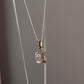 Handcrafted rose quartz square cut pendant in polished silver