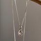 Rose quartz pear-shaped pendant in sterling silver