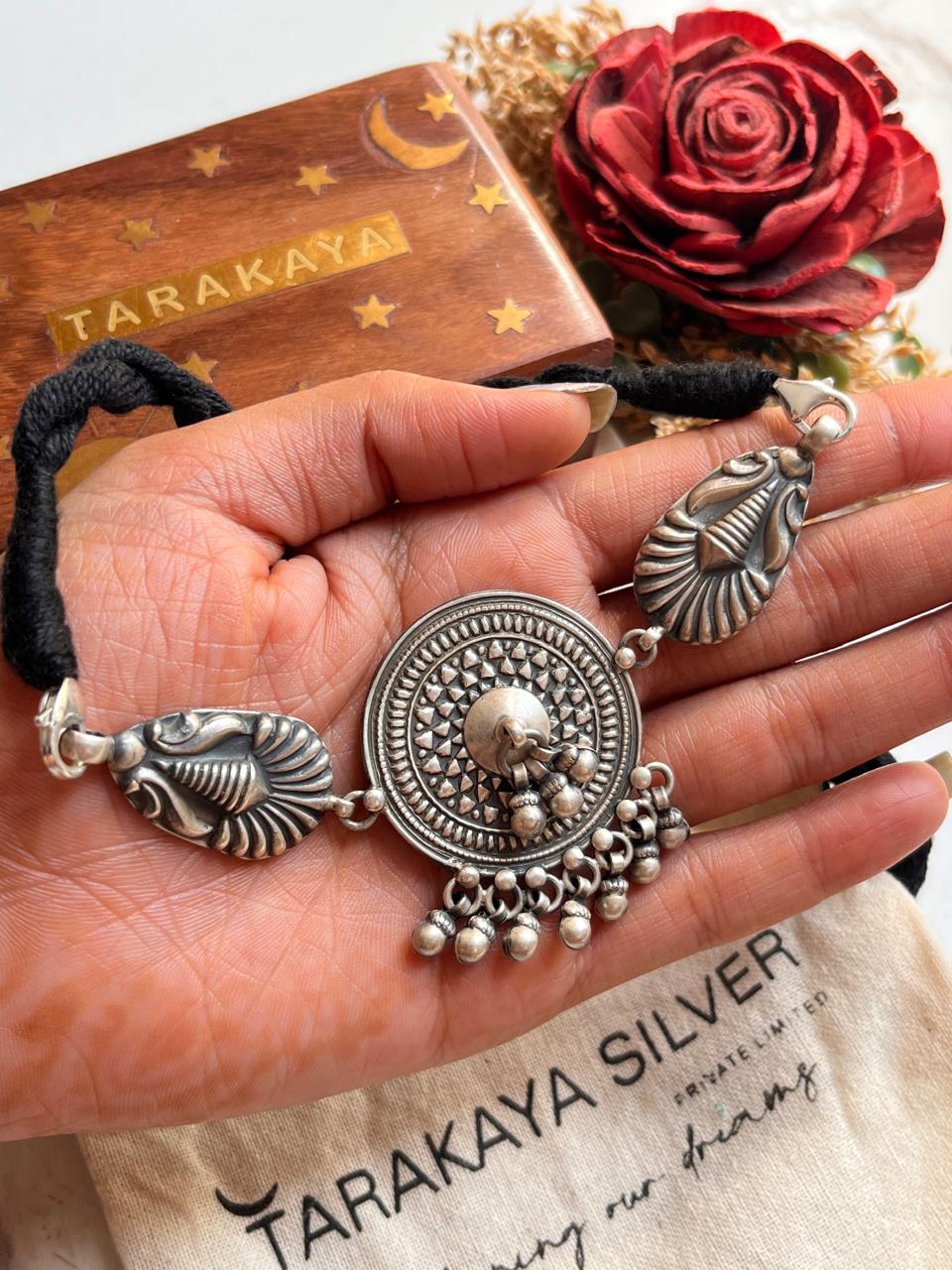 Elegant silver 925 choker with antique mandala and ghungroo charm details.