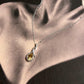 Beautiful citrine cross solitaire silver pendant on a fine chain