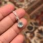 Timeless round aqua chalcedony gemstone pendant in silver.
