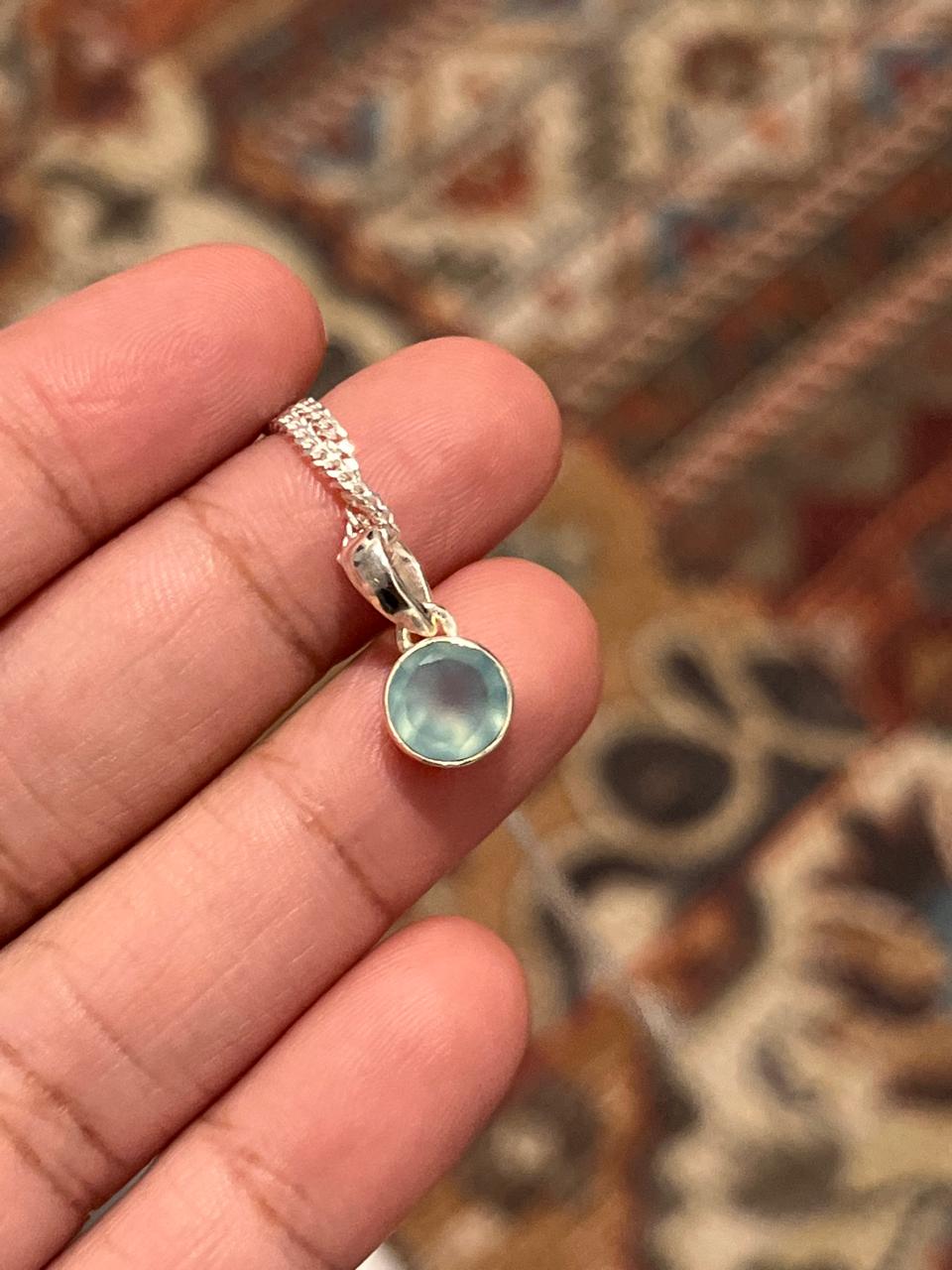 Timeless round aqua chalcedony gemstone pendant in silver.