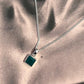 Stylish square cut green onyx pendant with a polished silver setting