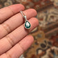 Sterling silver pendant featuring a green onyx pear stone