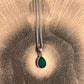Timeless green onyx pear-shaped gemstone pendant in sterling silver
