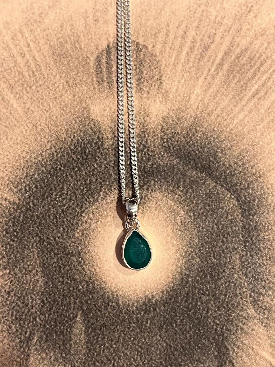 Timeless green onyx pear-shaped gemstone pendant in sterling silver