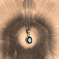 Elegant green onyx oval cut pendant set in silver