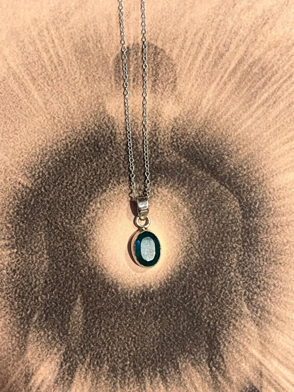 Elegant green onyx oval cut pendant set in silver