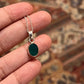 Sterling silver pendant featuring a green onyx oval stone