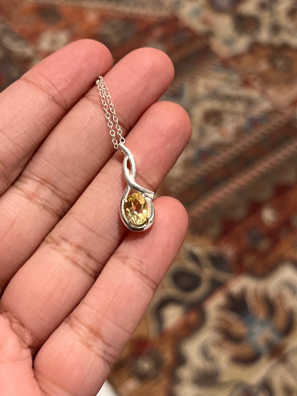 Stylish cross-shaped citrine solitaire pendant in sterling silver