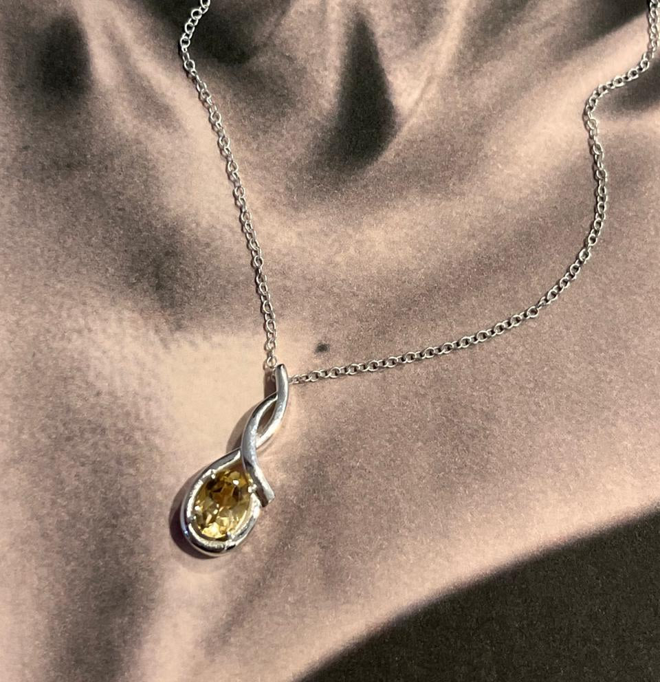 Handcrafted citrine solitaire stone in a cross design, silver pendant