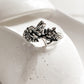 Enchanting fairy in the garden silver ring with intricate floral design