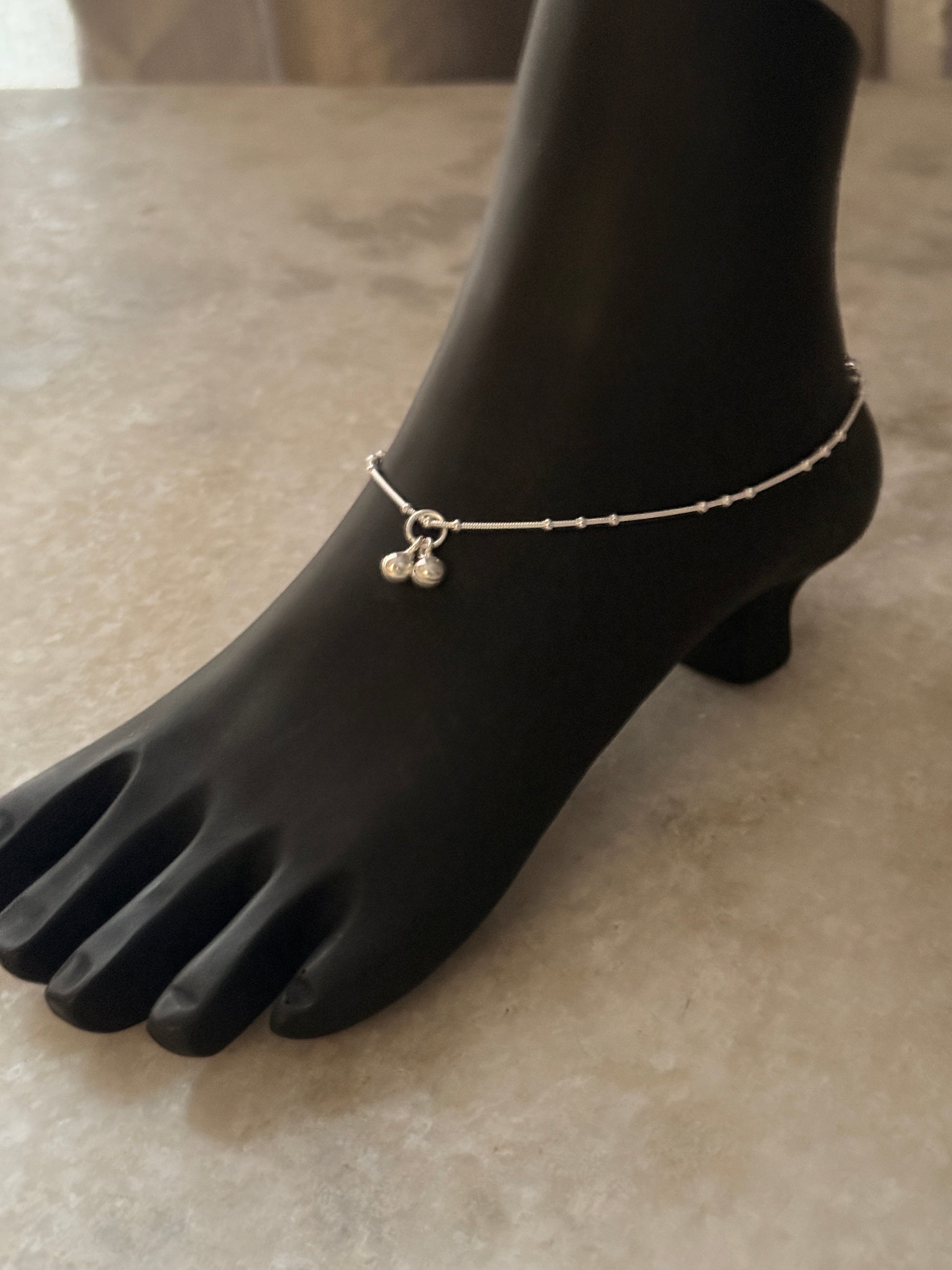 Handcrafted sterling silver anklet with snake dot pattern  