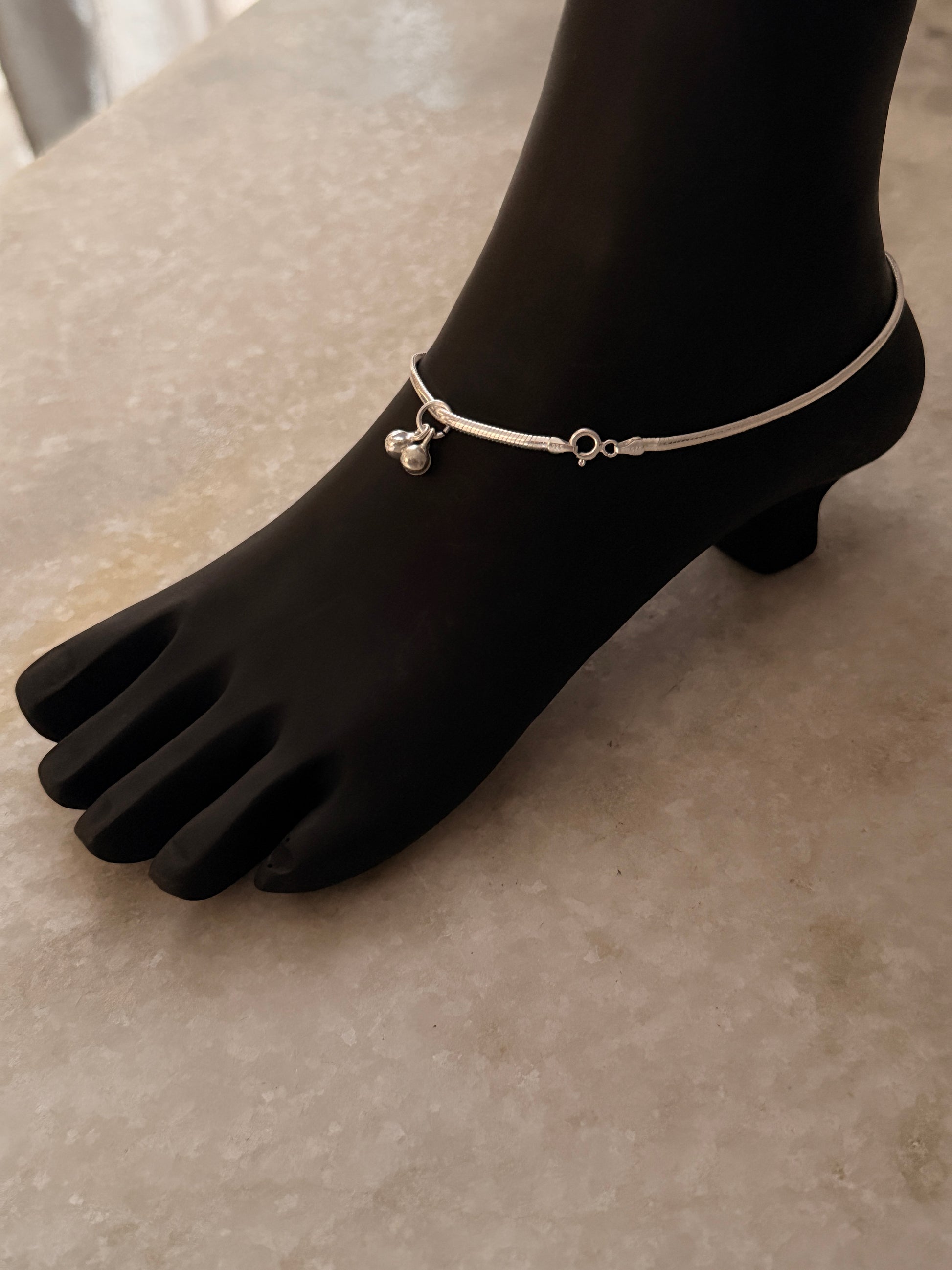 Bold flat snake chain anklet crafted in sterling silver  