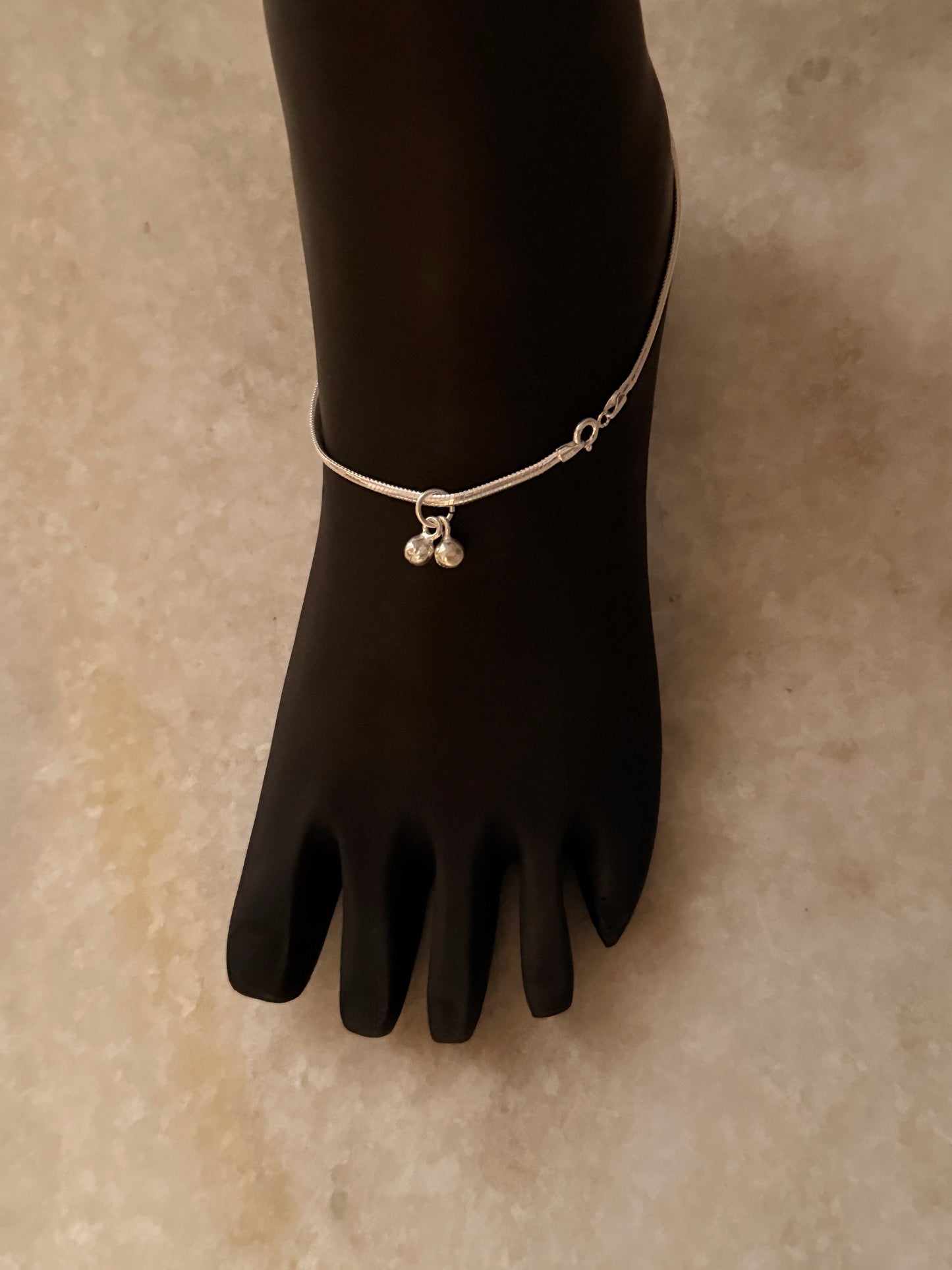 Chunky 925 silver anklet with sleek snake chain design  