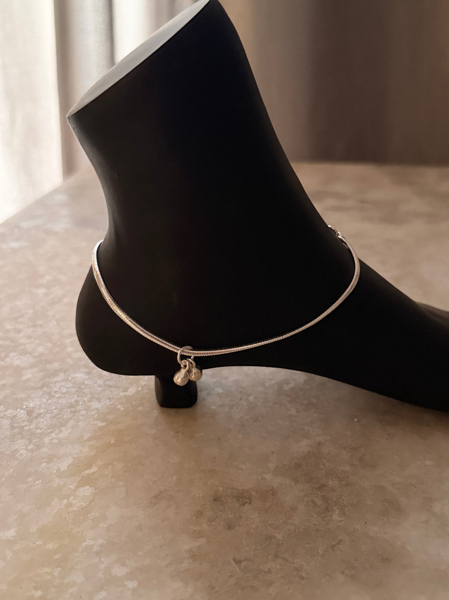 Contemporary chunky silver anklet with flat snake design