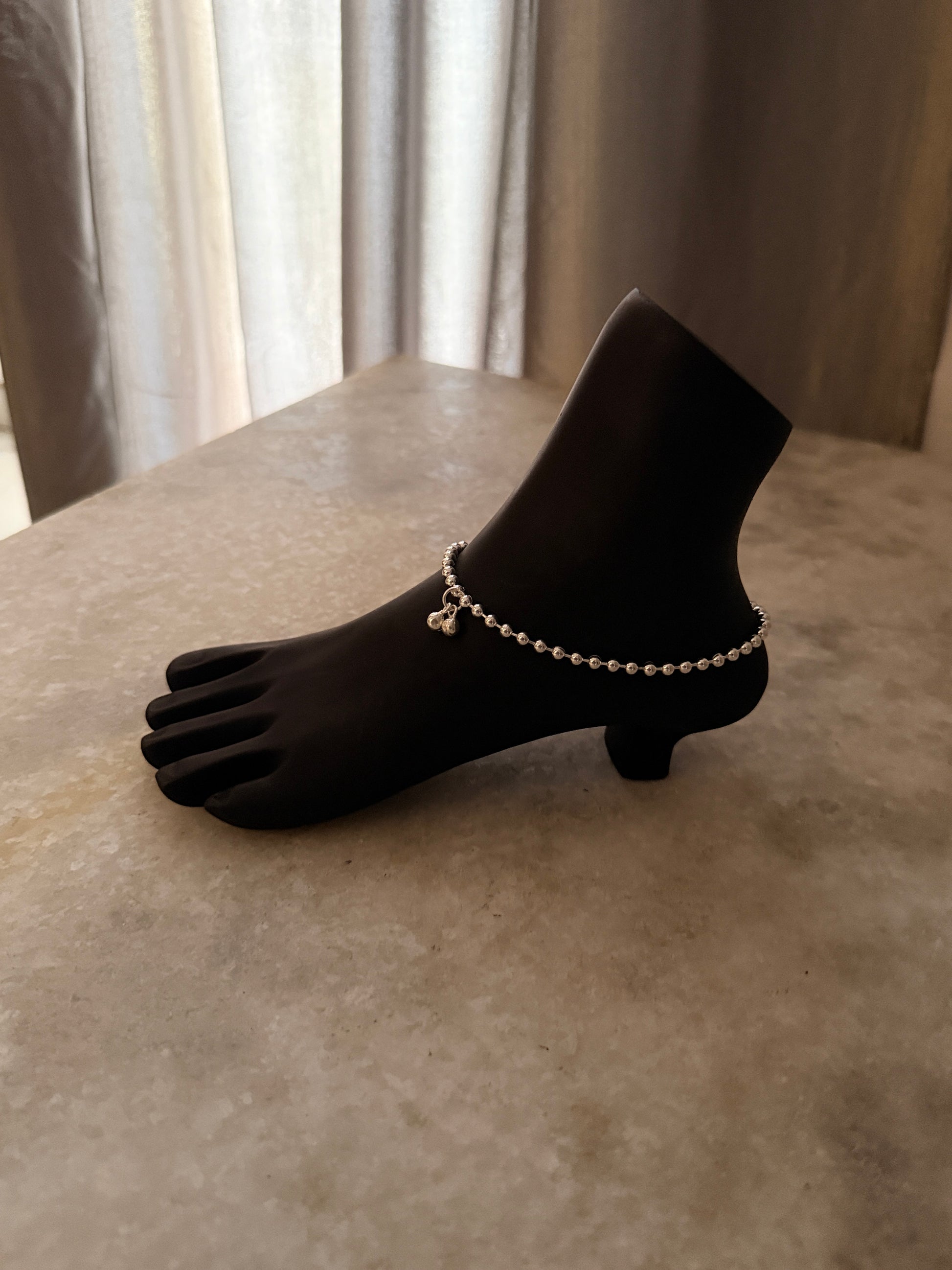 Bold tribal-style silver anklet with chunky ball design  