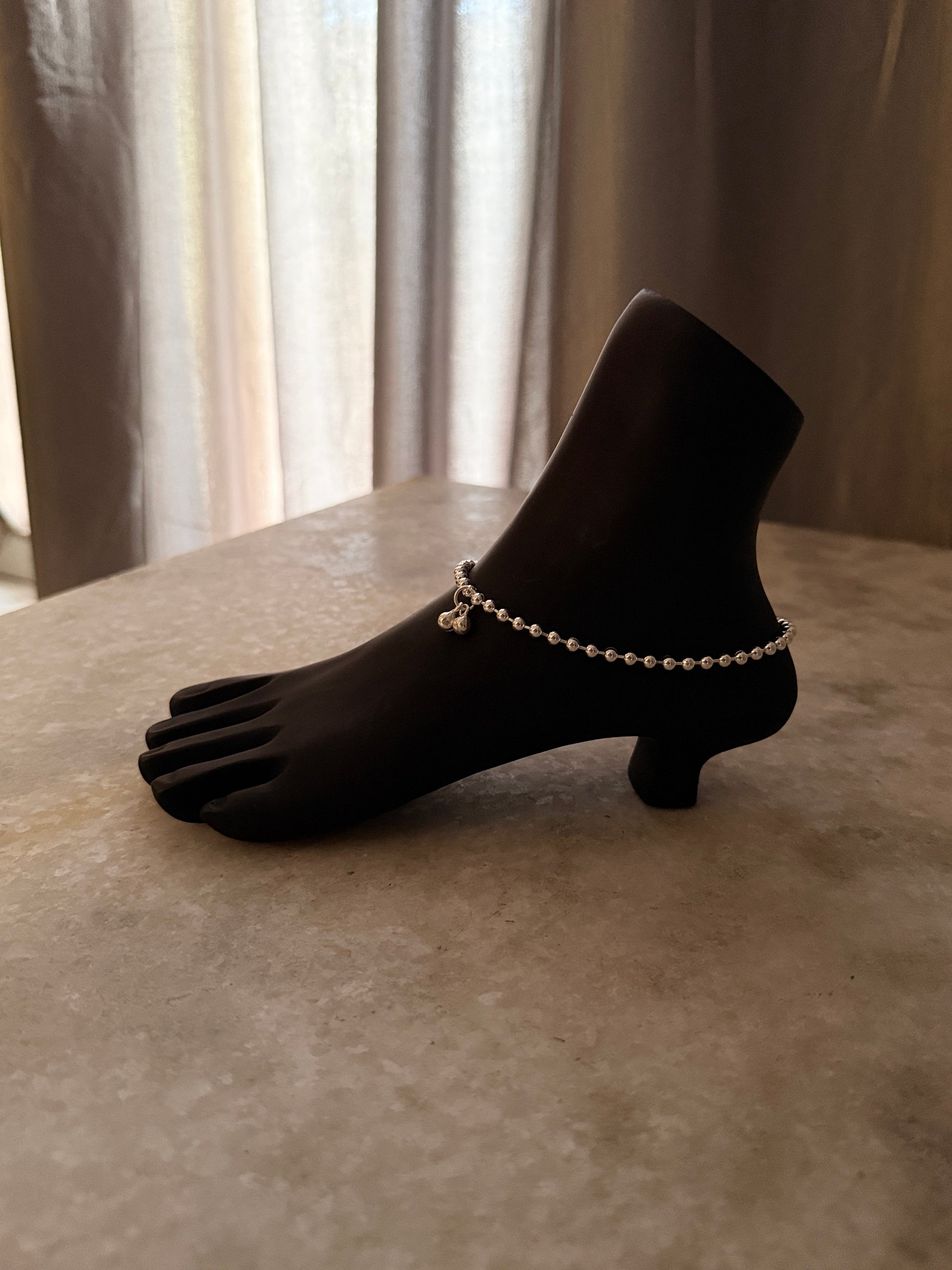 Bold tribal-style silver anklet with chunky ball design 