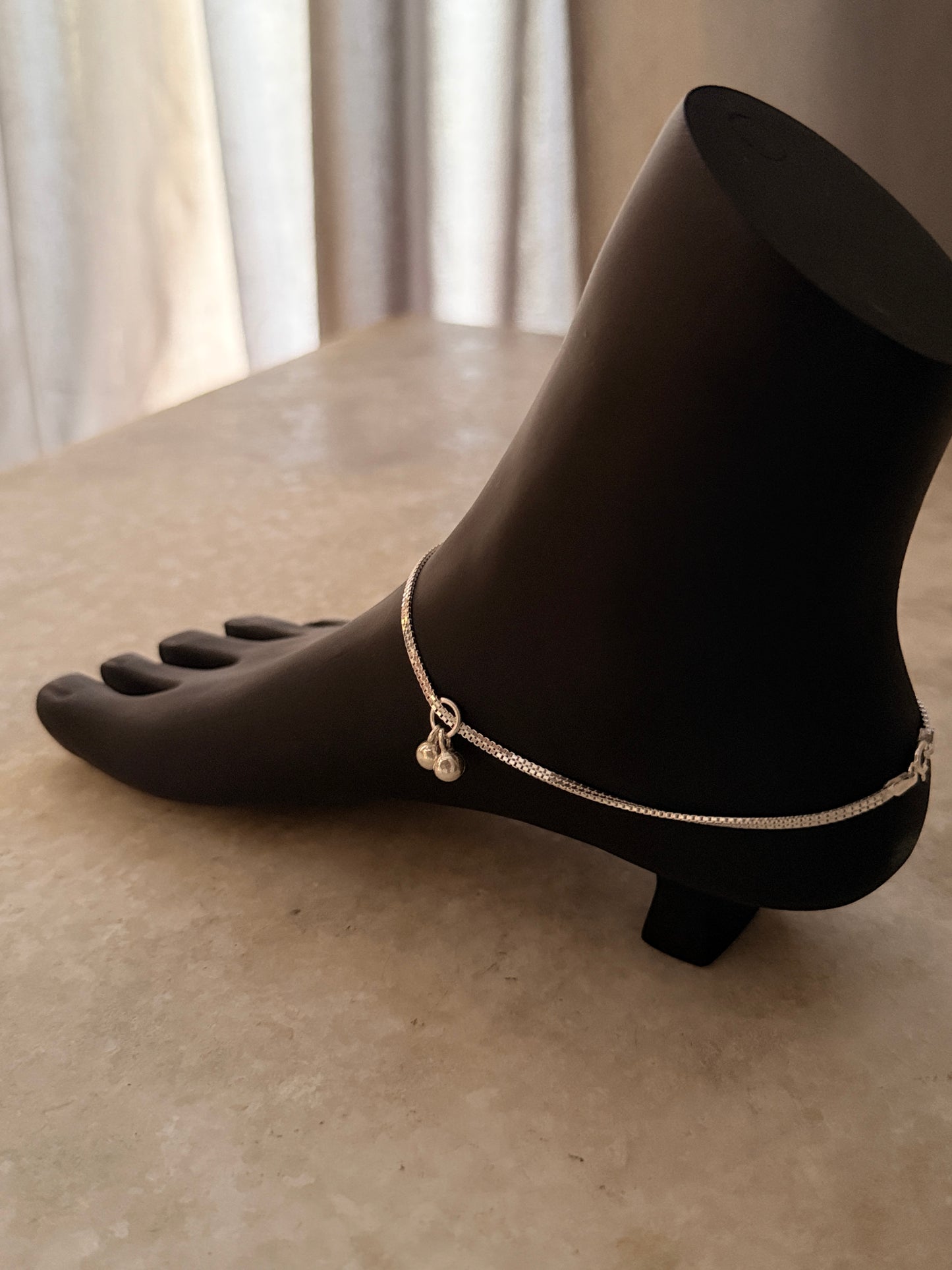 Polished flat box chain anklet crafted in sterling silver